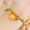 Golden Wealth Deity Knot Bracelet