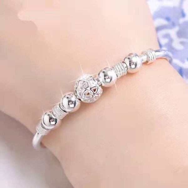 Nine Turn Fortune Bead Silver Plated Copper Bangle