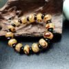 Tibetan Three-Eyed Dzi Agate Buddhist Bead Bracelet