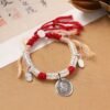 Tibetan Zaki Lhamo Red String Wealth Bracelet